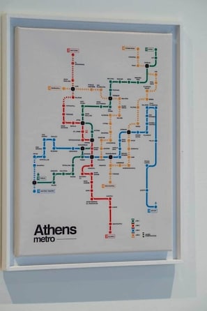 A framed Athens metro map with multiple lines and stations. - Fun - Sized Design studio next to Acropolis (Athens)