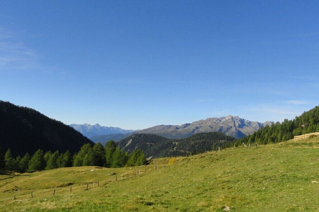 A mountainous landscape with a clear sky.