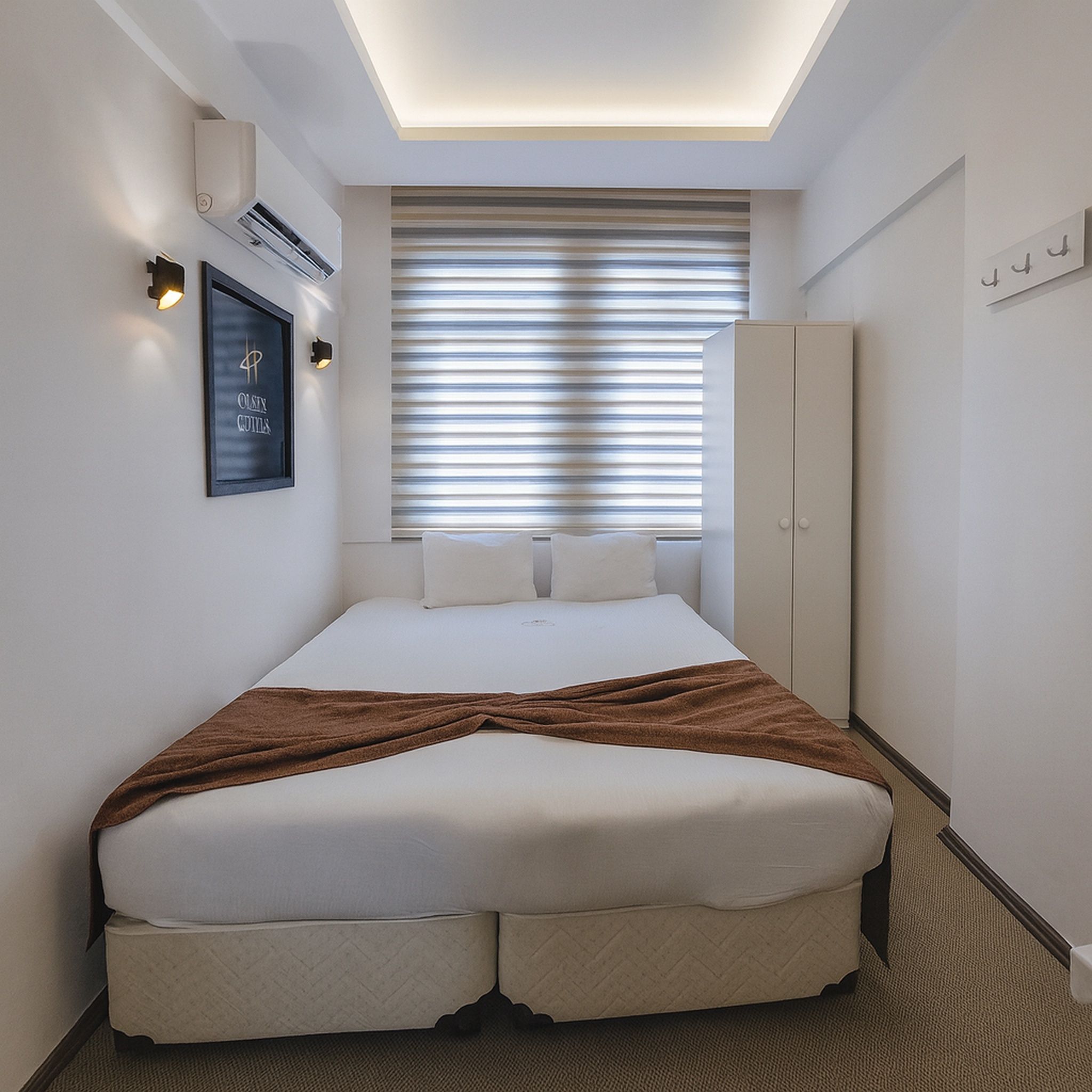 Quarto econômico, ar-condicionado, vista para a cidade | Wi-Fi de cortesia