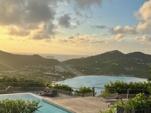 A pool area with a view of the sea and mountains. - The Coconut | Cozy 1-Bedroom Apartment in the Hills of Saint Jean (Saint Jean)