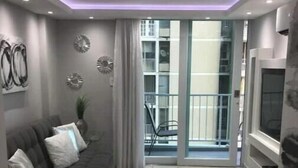 Living area - Steps from Beach Luxury Apt (Carolina)