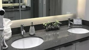 Bathroom - Steps from Beach Luxury Apt (Carolina)