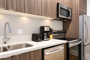 🍳 Full chef’s kitchen corner—featuring a dedicated coffee station, built-in microwave, and stainless dishwasher. - The Penn Hotel - Queen Bed, AC & Gaslamp Nightlife! (San Diego)