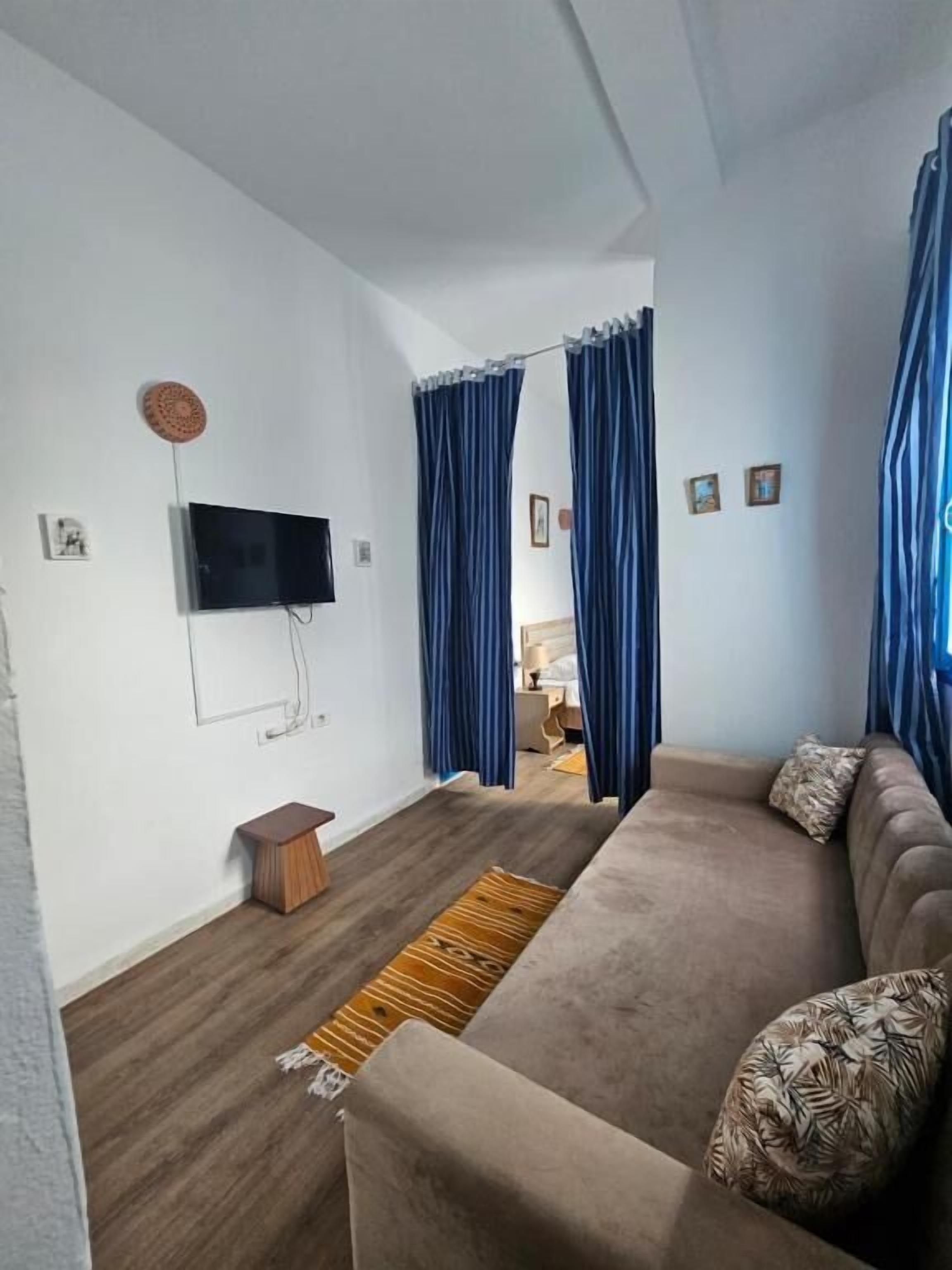 Suite – deluxe, bakgårdsutsikt | Oppholdsområde