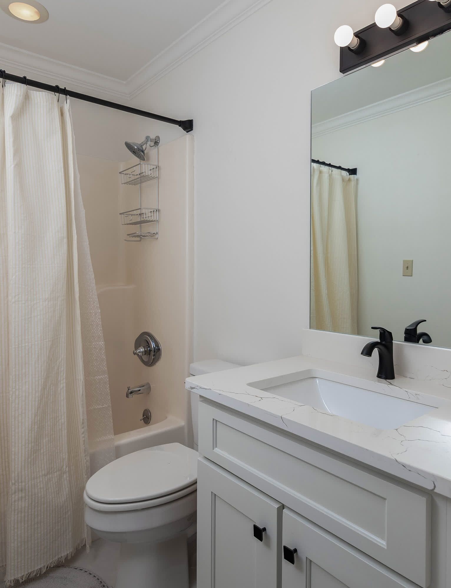 Shower, hair dryer, towels, shampoo