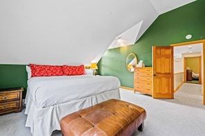 A bedroom with a bed, a bench, a dresser, and a mirror. - Quiet 4BR Adirondacks Dog Friendly - Hot Tub (Johnsburg)