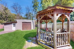 A wooden gazebo with a porch, a shed, and a well-maintained lawn. - 3BR Finger Lakes - Deck - Washer Dryer (Penn Yan)