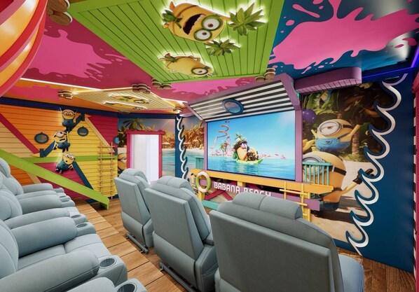 A children's play area with colorful walls, a slide, and seating. - 7BR house with private pool in clermont (Clermont)