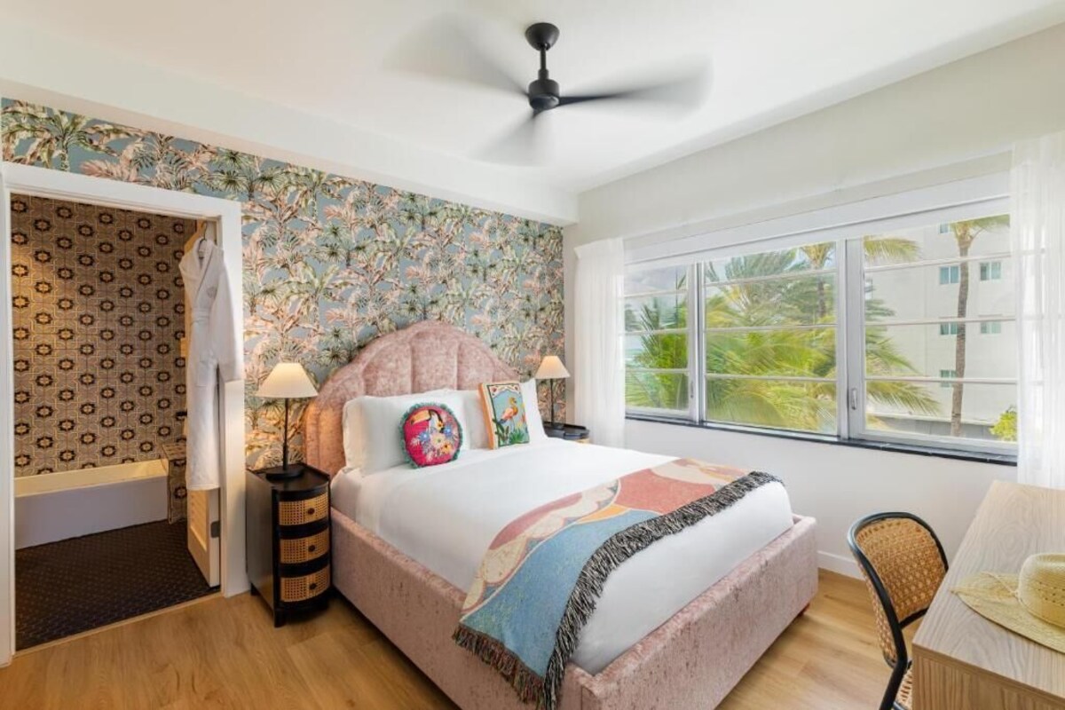 Premium Suite, Balcony, Ocean View | Desk, laptop workspace, blackout curtains