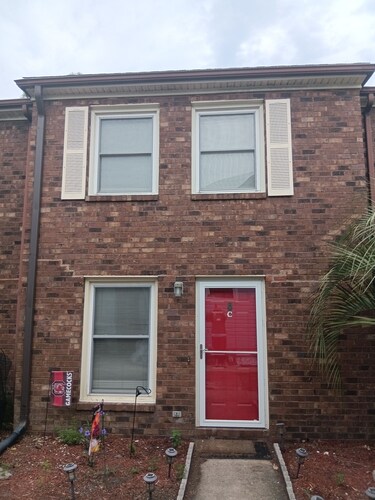 located blocks from the beach.  The cozy townhouse is just a short walk from.