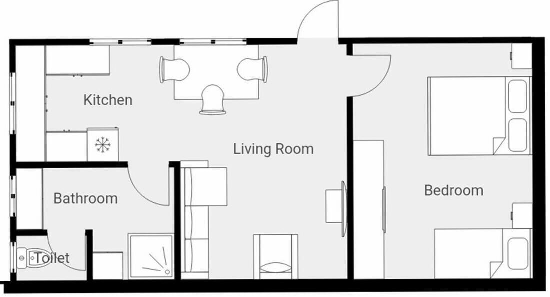 A floor plan with a kitchen, living room, bathroom, and bedroom.