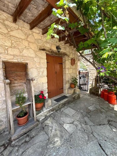 Lantana Stone House.
Where the wild thyme scents the stone.