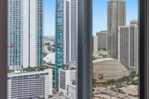 A high-rise building with multiple floors and a modern architectural design. - Luxury E11EVEN Suite with Amazing Pool & Views (Miami)