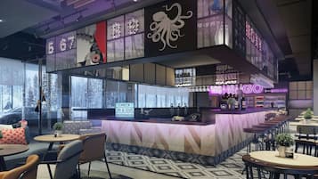 A modern bar area with a sushi menu, a check-in/out sign, and a neon sign.