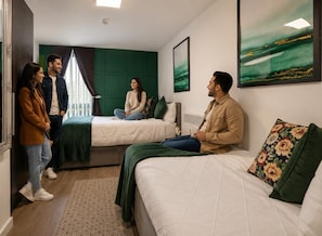 A room with two beds, a mirror, and artwork on the walls. - Central Access, Self-Check-in, 2BR2Bath, Stepless (Liverpool)