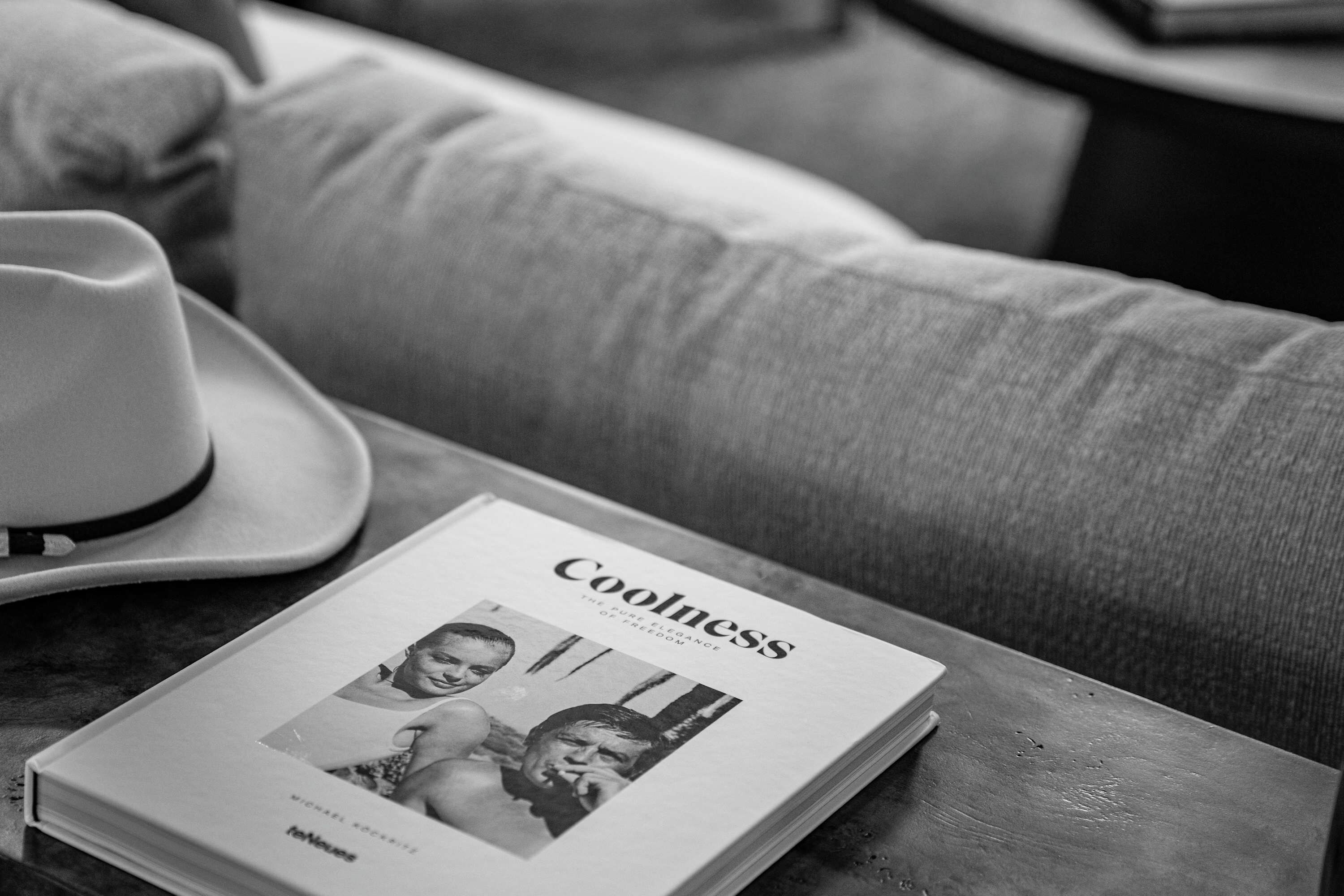 A magazine titled 'Coolness' on a wooden table.