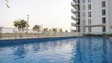 Take a refreshing dip or unwind by the pool in a relaxing setting designed for leisurely moments.”