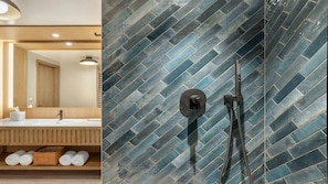 Ein modernes Badezimmer mit einer backsplash aus Fischgrätmusterfliesen, einem Holzkosmetikschrank und einem Handtuchhalter.