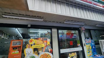 A 7-Eleven convenience store with a large sign above the entrance.