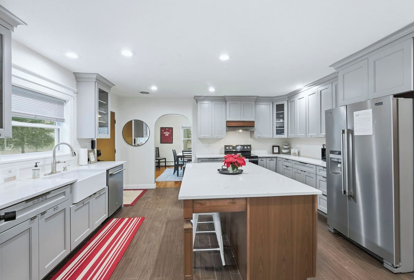 Prep large family meals at the quartz island in this fully equipped Fort Wayne kitchen which features stainless steel appliances and ample counter space.