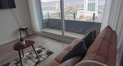 Apartment with an ocean view across from the harbor/downtown