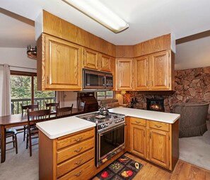 The cozy kitchen is well equipped for an unforgettable getaway​ - Aspen Glen Mountain Escape (Green Valley Lake)