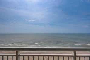 A beach view with a clear sky and calm sea. - 15th-Floor Balcony! Myrtle Beach Oceanfront Oasis (Myrtle Beach)