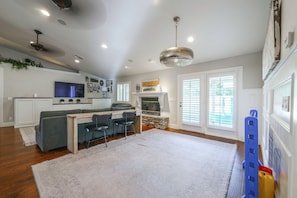 A modern kitchen with white cabinets, a built-in oven, and a large window. - Close to Hiking! Family-friendly Mesa Retreat (Mesa)
