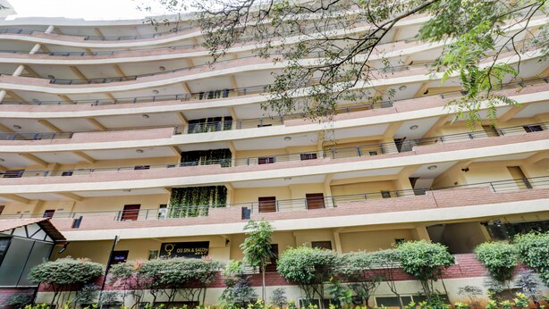 A multi-story building with balconies and a spa & salon sign. - Gardeenia Comfortes  (Bommasandra)