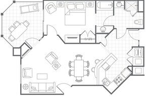 Un plan d’étage d’une chambre d’hôtel comprenant un lit, un bureau, une chaise, une table et une salle de bain.