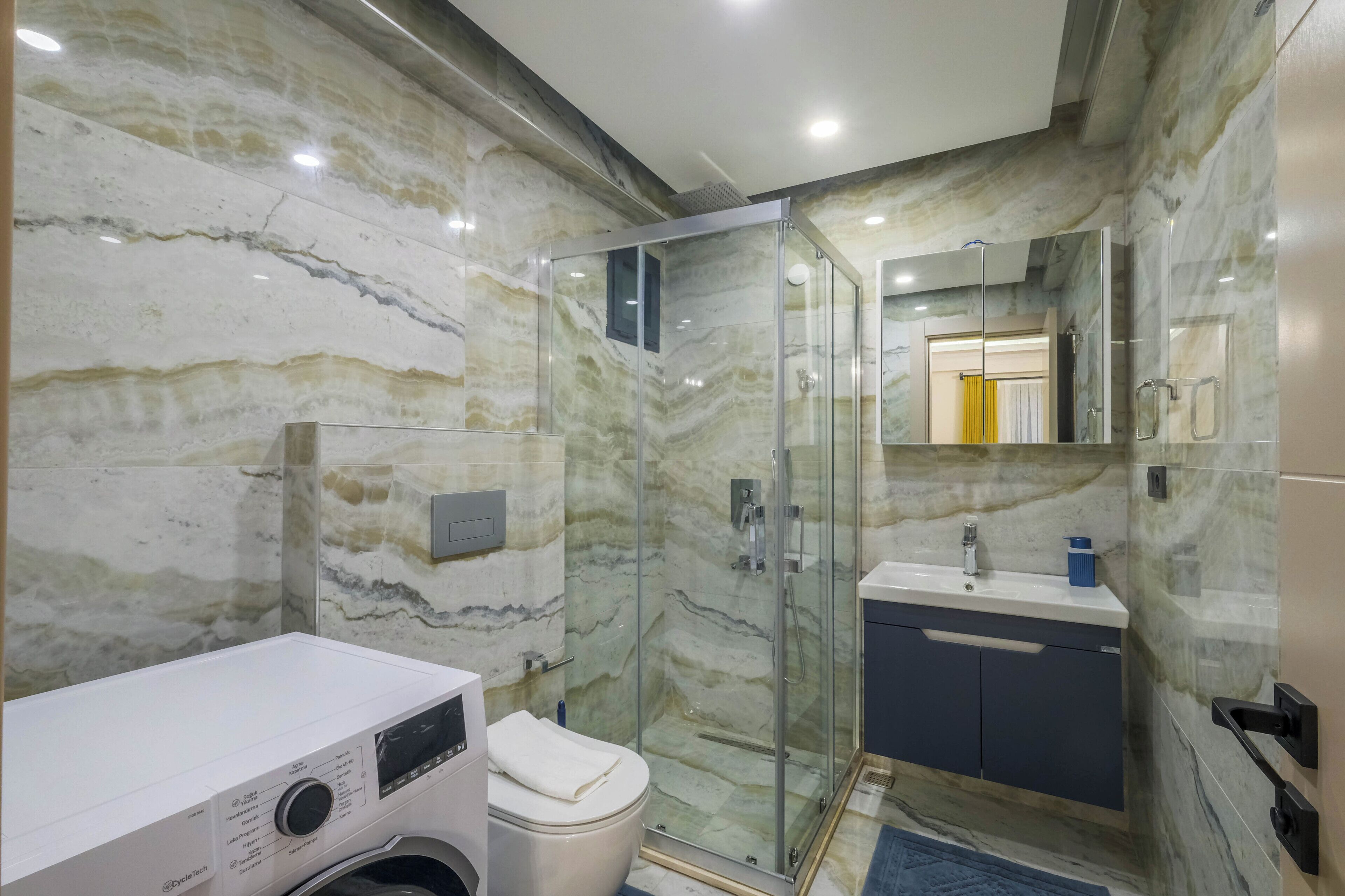 Standard Condo, Balcony, City View | Bathroom | Shower, hair dryer, towels, soap