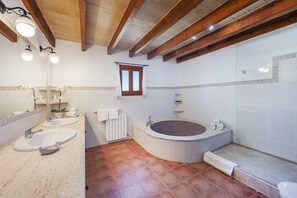 A bathroom with two sinks, a bathtub, and a window. - Country Villa With Garden for 6 (Pollença)