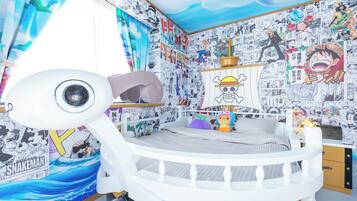 A child's room with a bunk bed, manga posters on the walls, and a ceiling mural.