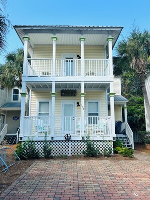 A two-story building with a balcony, a sign reading 'Emerald Jewel,' and a mailbox. - Charming 30A Beach Home, 5Min walk to Gulf, on front of the community pool, A/C (Santa Rosa Beach)