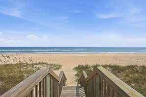 A wooden boardwalk leading to a beach with ocean views. - Almost Heaven | Beachside Living, Ocean Breezes (North Topsail Beach)