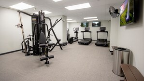 A gym with exercise equipment, treadmills, and a TV on the wall. - SC 2207 | Mountain Summer Escape with Refreshing Pool Access (Snowshoe)