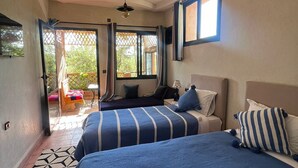 Espacio para trabajar con laptop, wifi gratis y ropa de cama 