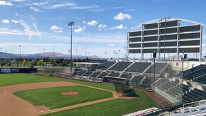 A baseball stadium with multiple seating tiers, a large scoreboard, and a clear sky. - Easygoing Pasco Stay Near Family Fishing Pond & Columbia River Walks (Pasco)