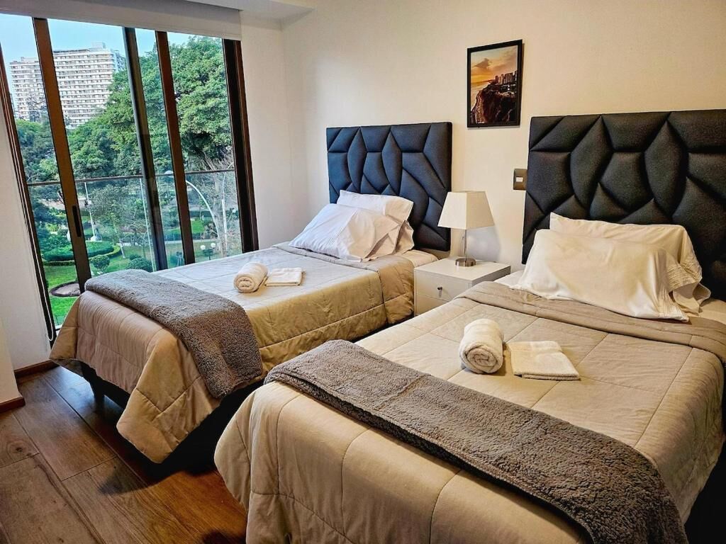 Blackout drapes, iron/ironing board, WiFi (free)