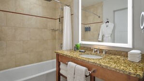 A bathroom with a bathtub, a sink, a mirror, and a shower. - Luxury Studio Suites in Westin Riverfront Villa in Avon, CO -Minimum 3 nights (Avon)