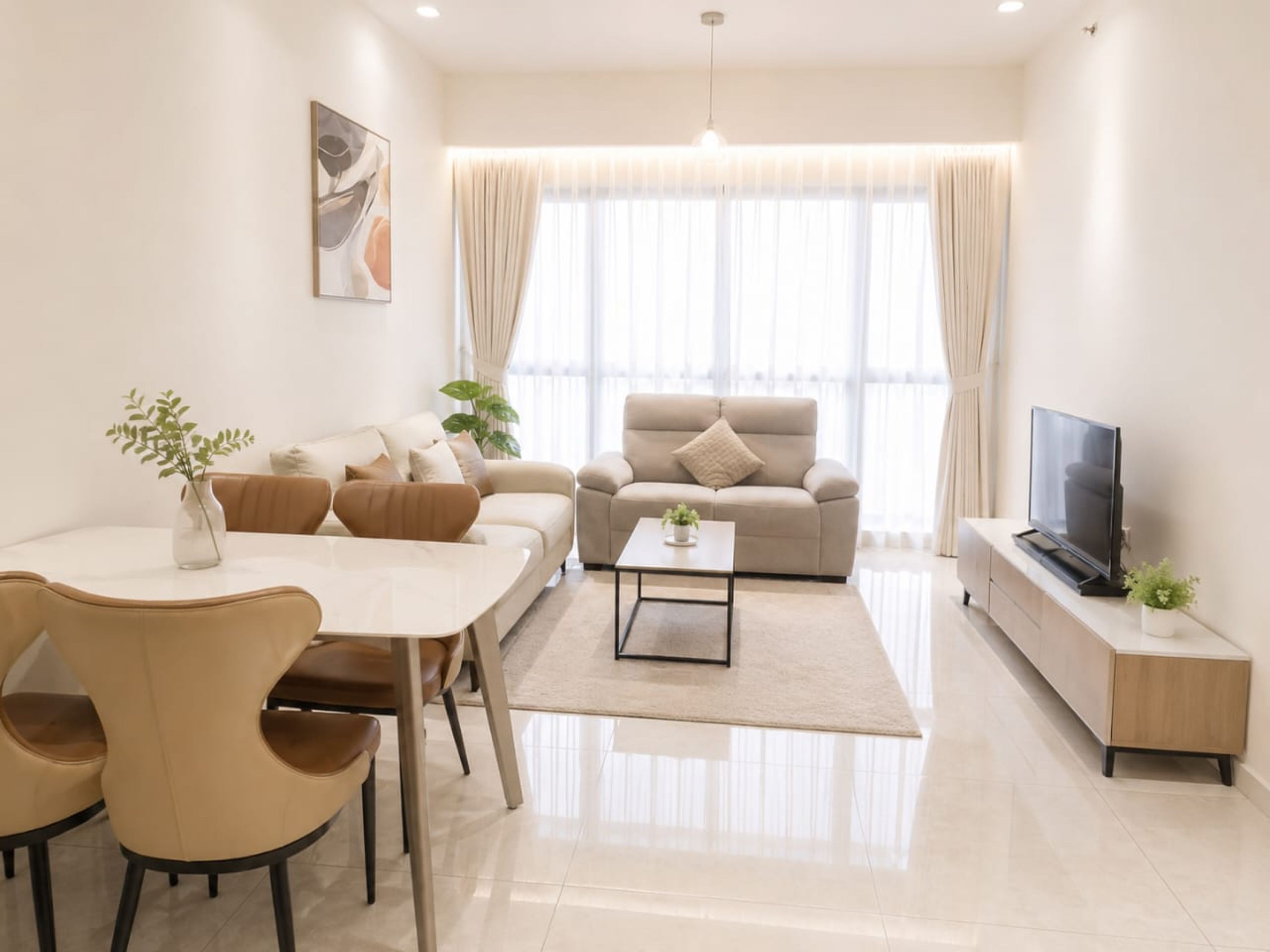 A modern living room with a sofa, a dining table with chairs, a coffee table, a TV on a stand, and a large window with curtains.