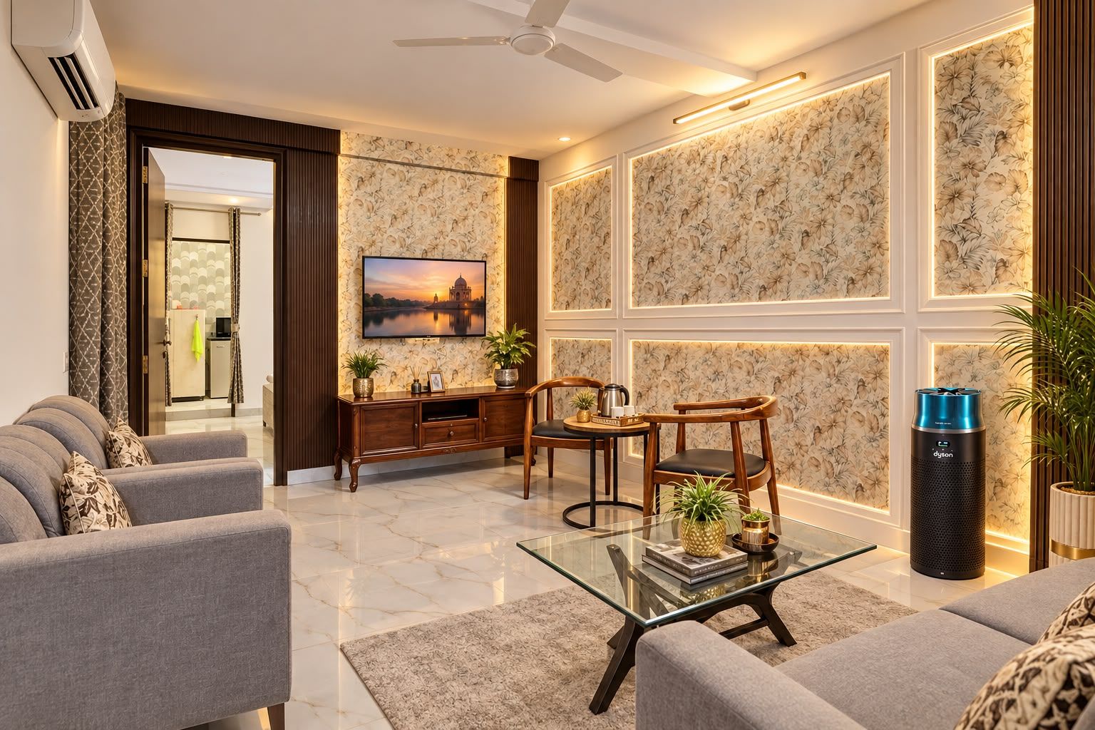 A modern living room with a sofa set, a coffee table, and a television.