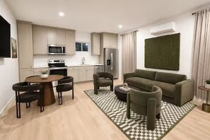 Modern open-concept suite with chic lounge seating and full kitchenette - King Bed-Unbeatable Location-Bishop Arts- Unit 3 (Dallas)