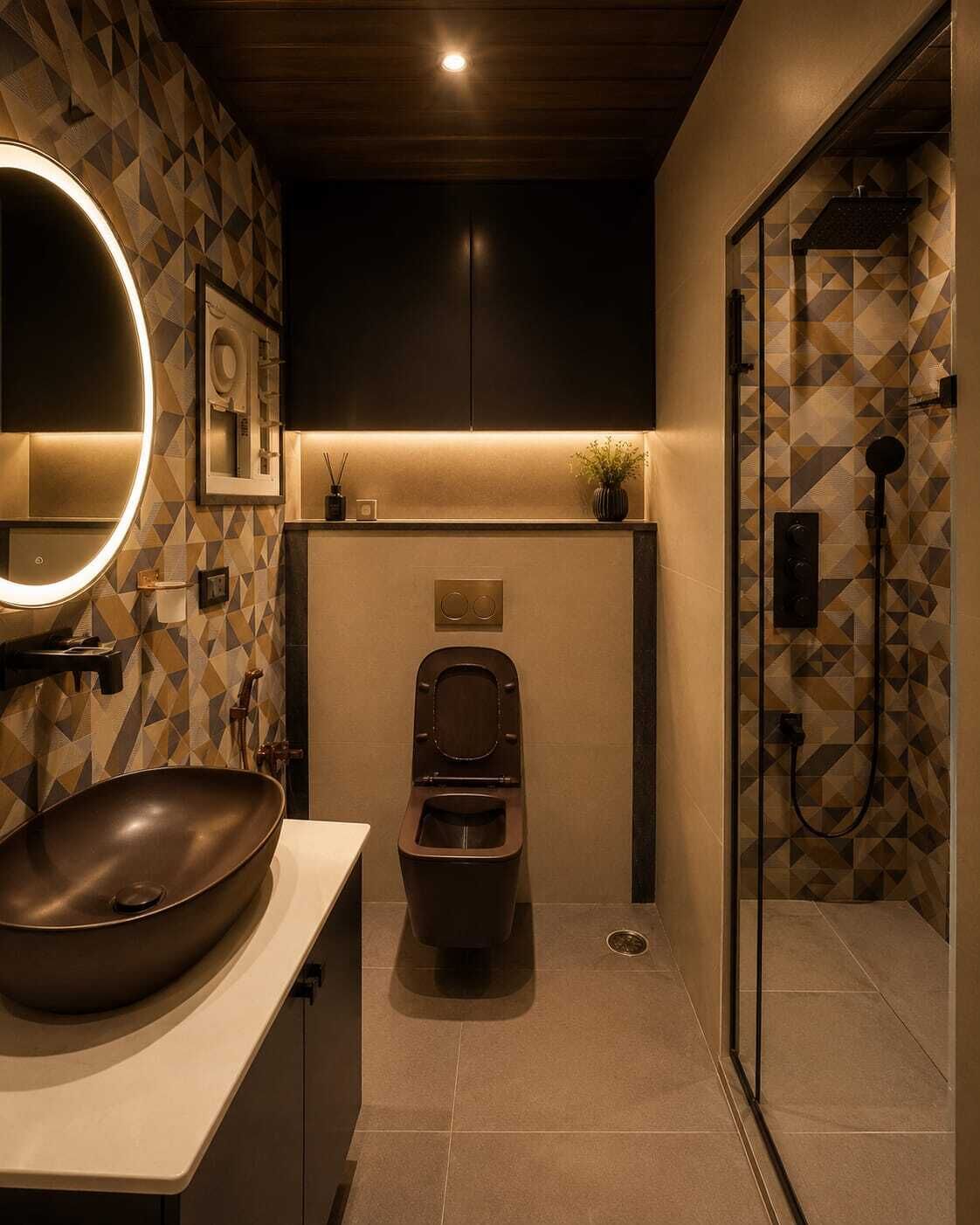 Un baño moderno con un espejo redondo, un lavabo a la vista, un inodoro y una zona de ducha.