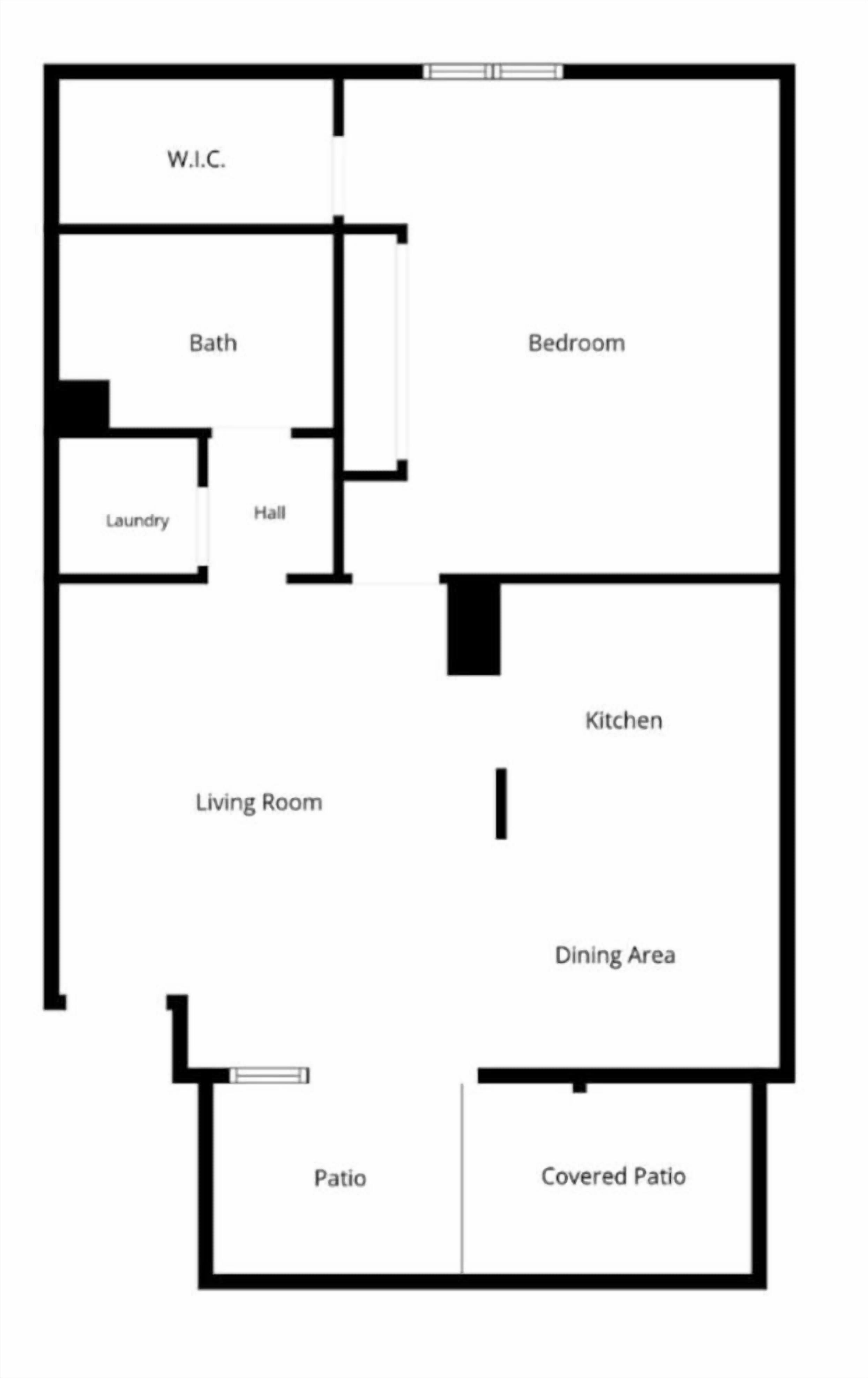 A floor plan with a W.C., bathroom, bedroom, living room, kitchen, dining area, patio, and covered patio.