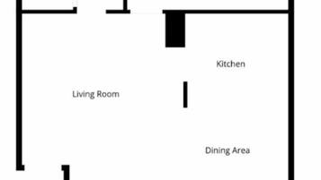A floor plan with a W.C., bathroom, bedroom, living room, kitchen, dining area, patio, and covered patio.