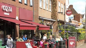 Farnham Common High Street with local restaurants, coffee shops - 8 min walk.