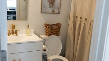 Hair dryer, towels, soap, toilet paper