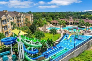 A resort with a water park, including slides and a pool area.