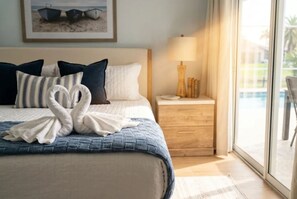 Bright, cozy bedroom with poolside access and thoughtful resort-style touches - Camino Del Mar | Canal | Heated Saltwater Pool| Dock +Fenced (Palm Coast)